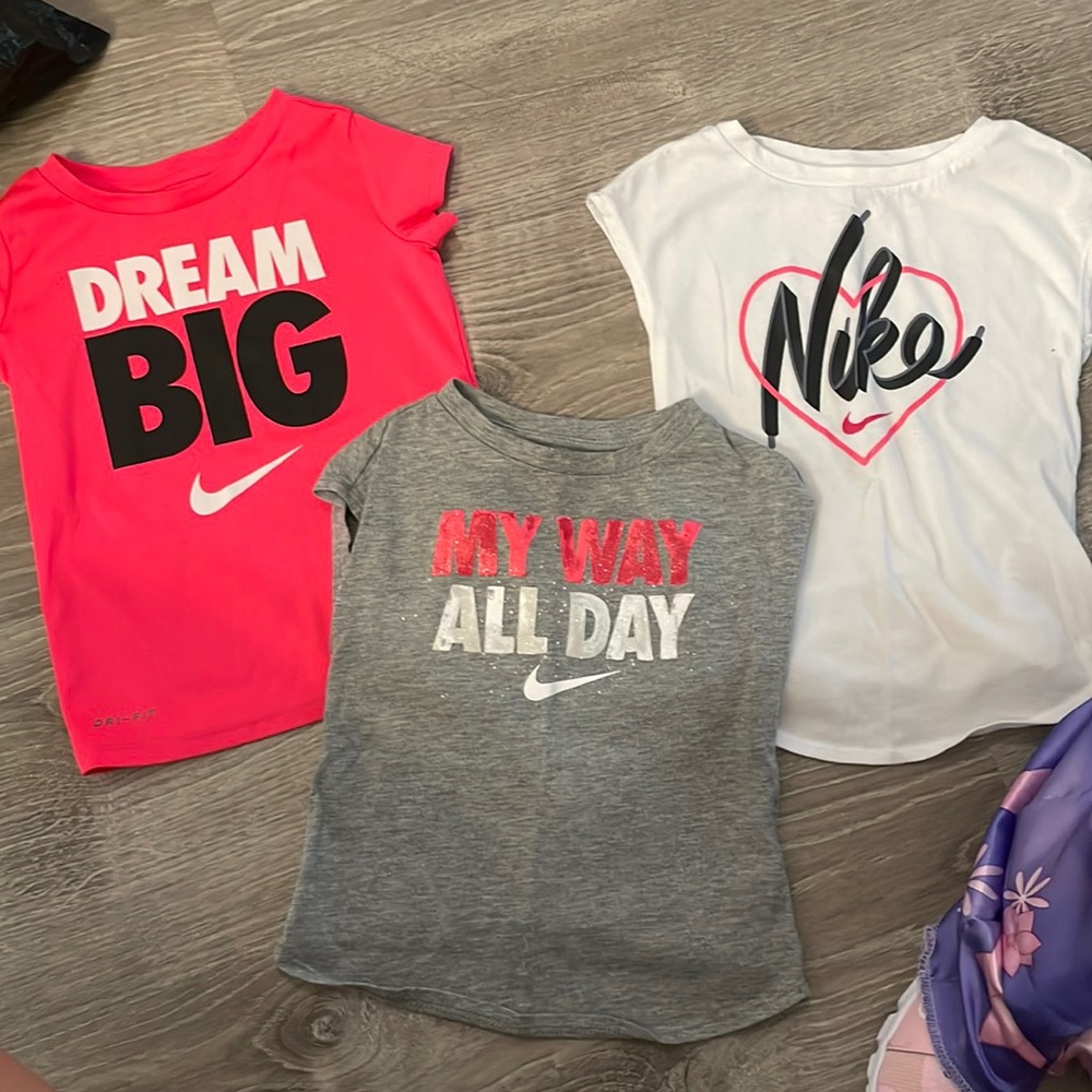 Play condition Nike tops. Toddler girls size 3T